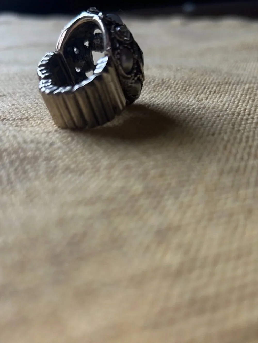 Vintage style sliver-tone dome cocktail ring featuring an intricate cluster of
